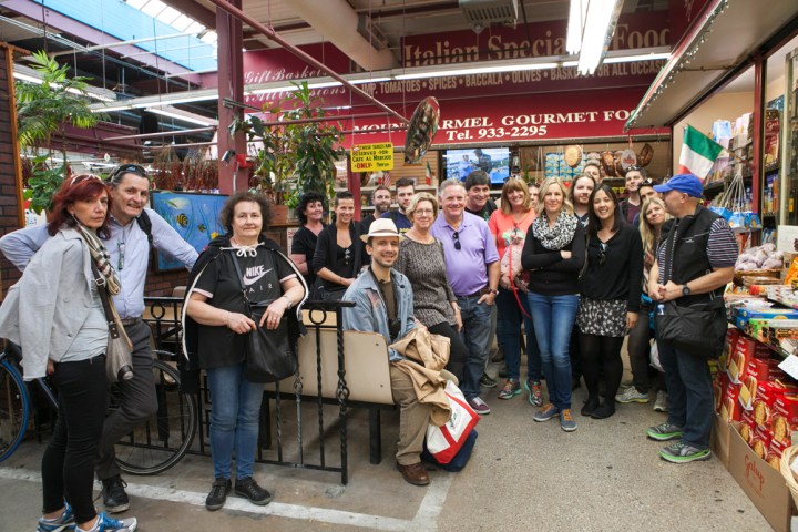 Giorgio Fracalossi et al. standing in front of a store