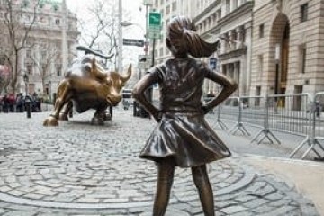 a woman walking down a street