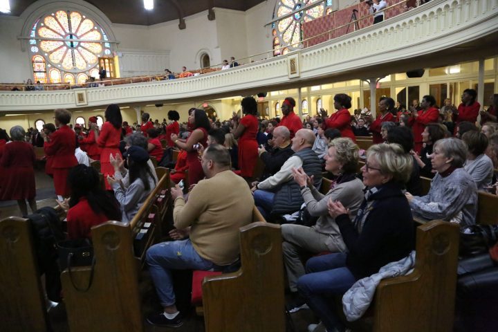 a large crowd of people in a room