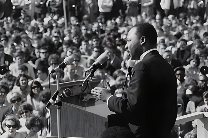 a man standing in front of a crowd